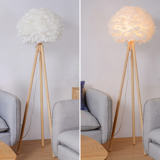 Minimalist White Dome Floor Lamp with Feather Detail and Wood Tripod Base