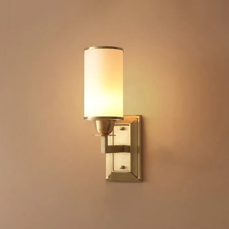 1-Light White Glass Wall Sconce in Traditional Brass - Elegant Cylindrical Dining Room Light