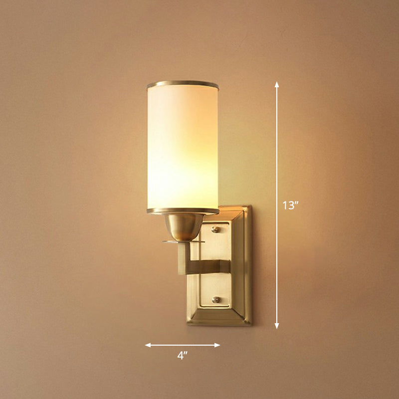 1-Light White Glass Wall Sconce in Traditional Brass - Elegant Cylindrical Dining Room Light