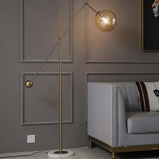 Simplicity 1-Light Bronze Amber Glass Sphere Floor Lamp with Balance Arm