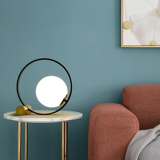 Sleek Black Bedside Table Lamp: Ring and Ball Night Light in Simplicity White Glass