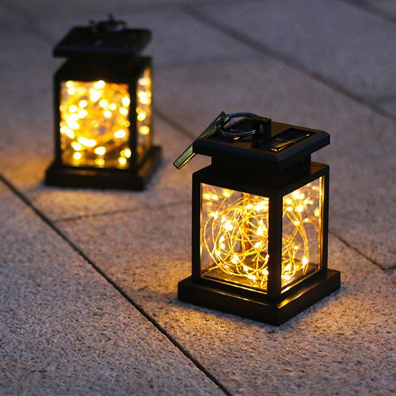 Artistic Black LED Solar Lantern Pendant Light with Clear Glass, Clamp, and Hook