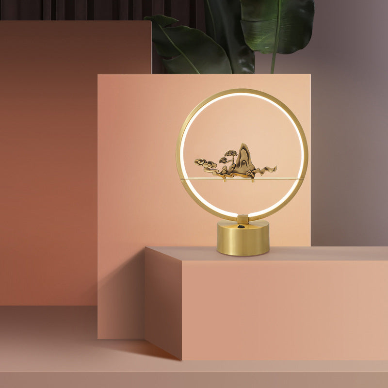 Loop LED Table Light: Artistic Metal Brass Night Lamp with Carved Mountain Decor