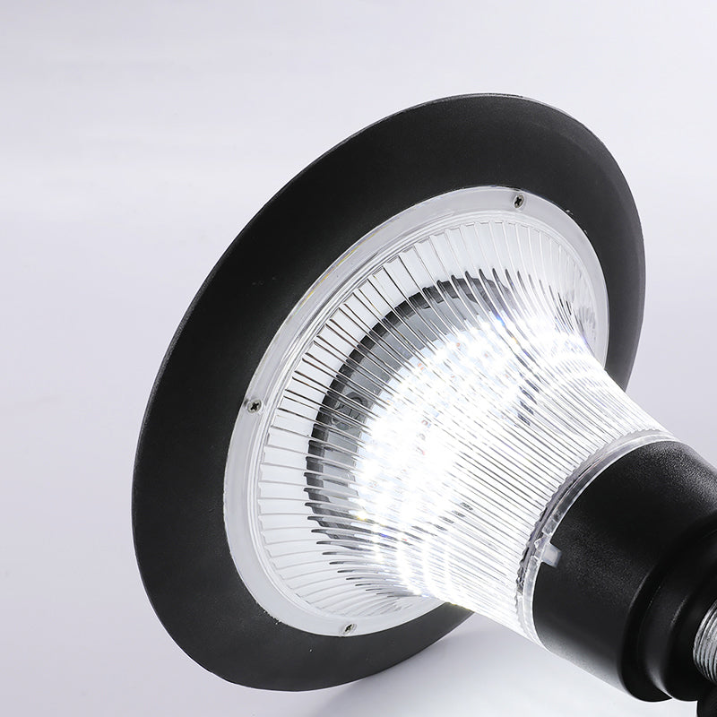 Sleek Black Solar Wall Light Fixture with Flared Design for Courtyard