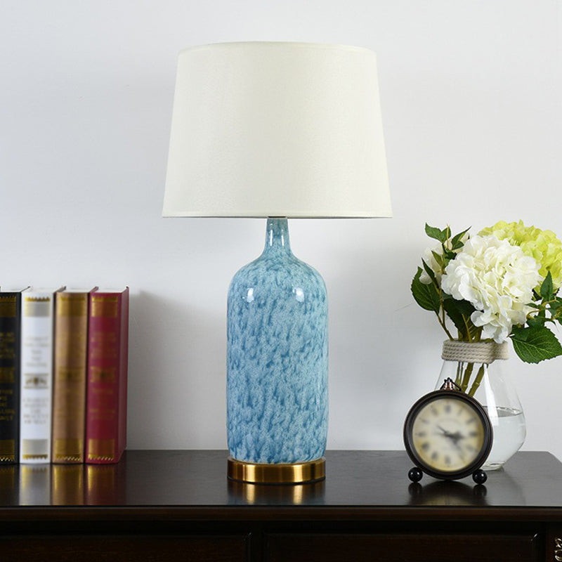 Blue Tapered Nightstand Lamp: Simplistic Fabric Table Light with Ceramic Jug Base