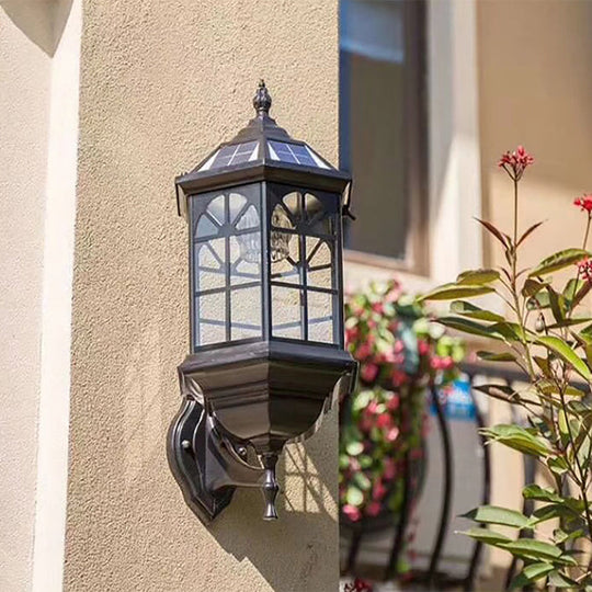Clear Glass Wall Sconce with Solar Panel for Outdoor Lighting