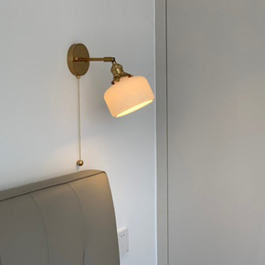Brass Pivot Joint Foyer Sconce: Round Ribbed Glass Wall Light with White Simplicity (1 Bulb)