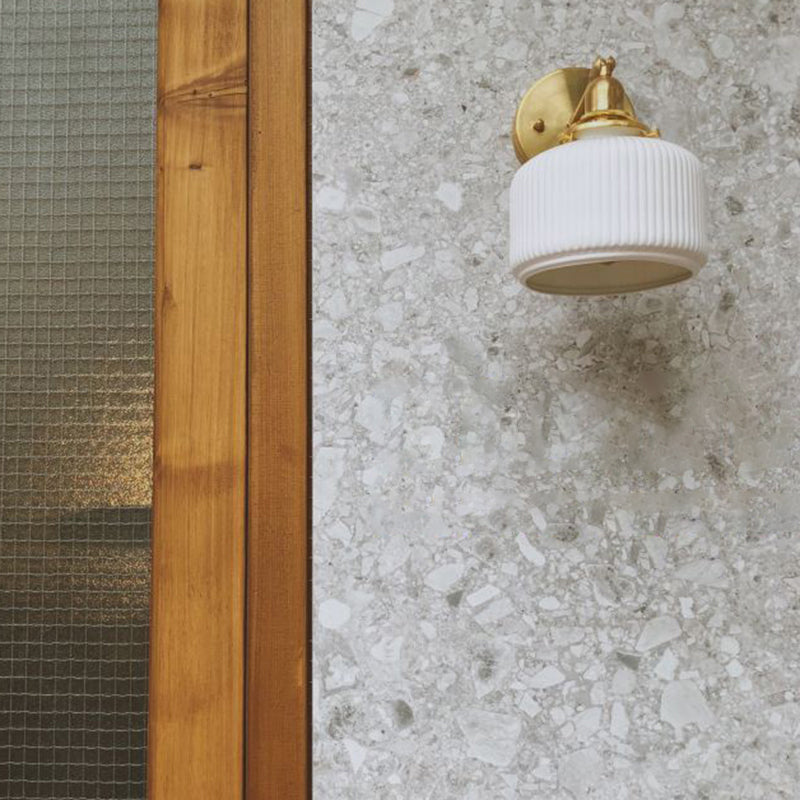 Brass Pivot Joint Foyer Sconce: Round Ribbed Glass Wall Light with White Simplicity (1 Bulb)