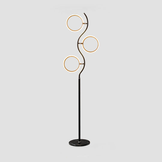 Rotatable 3-Head LED Floor Lamp - Artistic Metal Ring Shape for Bedroom