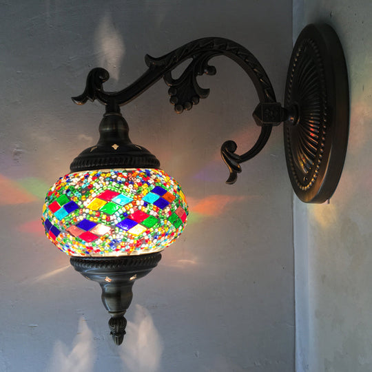 Curved Arm Sconce Light: Traditional Metal 1-Head Bronze Wall Lamp with Ball Yellow/Green Glass Shade for Balcony