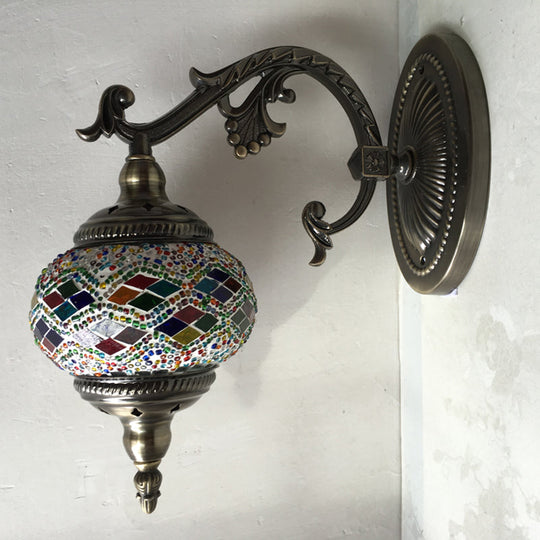 Curved Arm Sconce Light: Traditional Metal 1-Head Bronze Wall Lamp with Ball Yellow/Green Glass Shade for Balcony