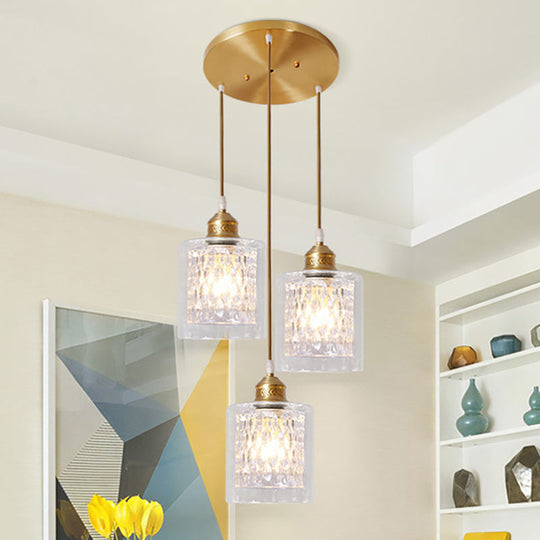 Modern Brass Cylinder Pendant Light with Prismatic Glass Shade - 3 Lights, Linear/Round Canopy