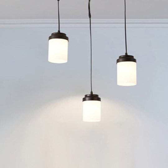 Contemporary Frosted Glass Pendant Lamp: Cylinder Shade Hanging Light in Black & White, Perfect for Kitchens