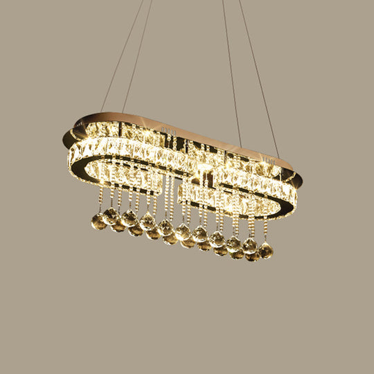 Modern LED Crystal Pendant Light with Stainless Steel Frame and Tassel Accents