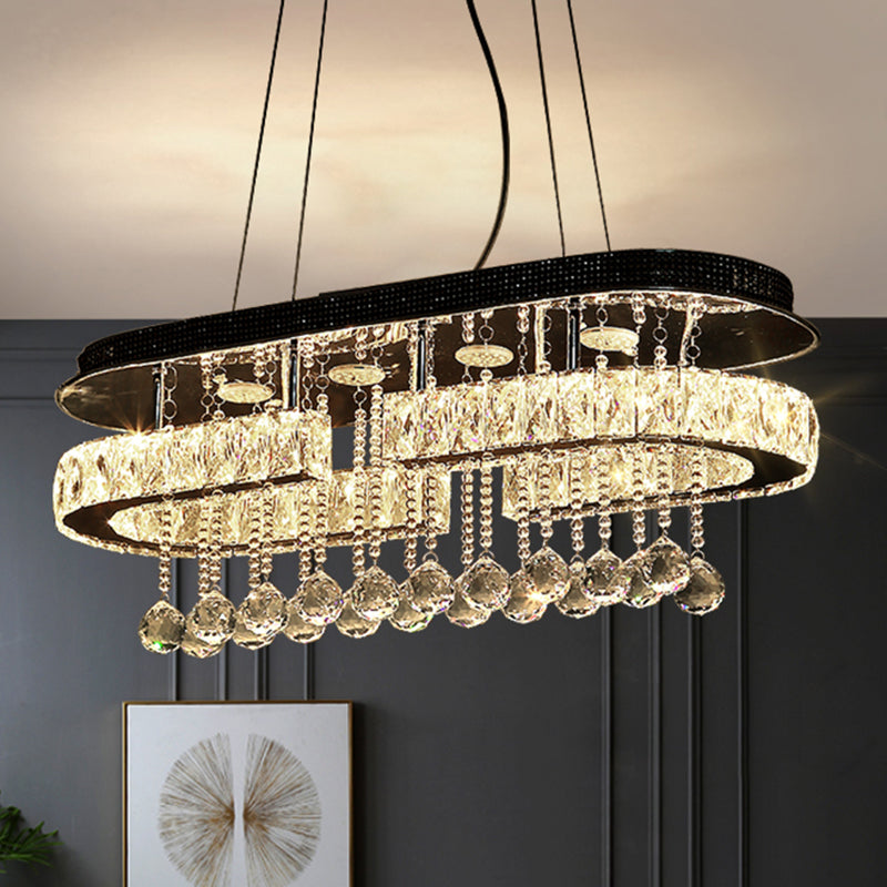 Modern LED Crystal Pendant Light with Stainless Steel Frame and Tassel Accents