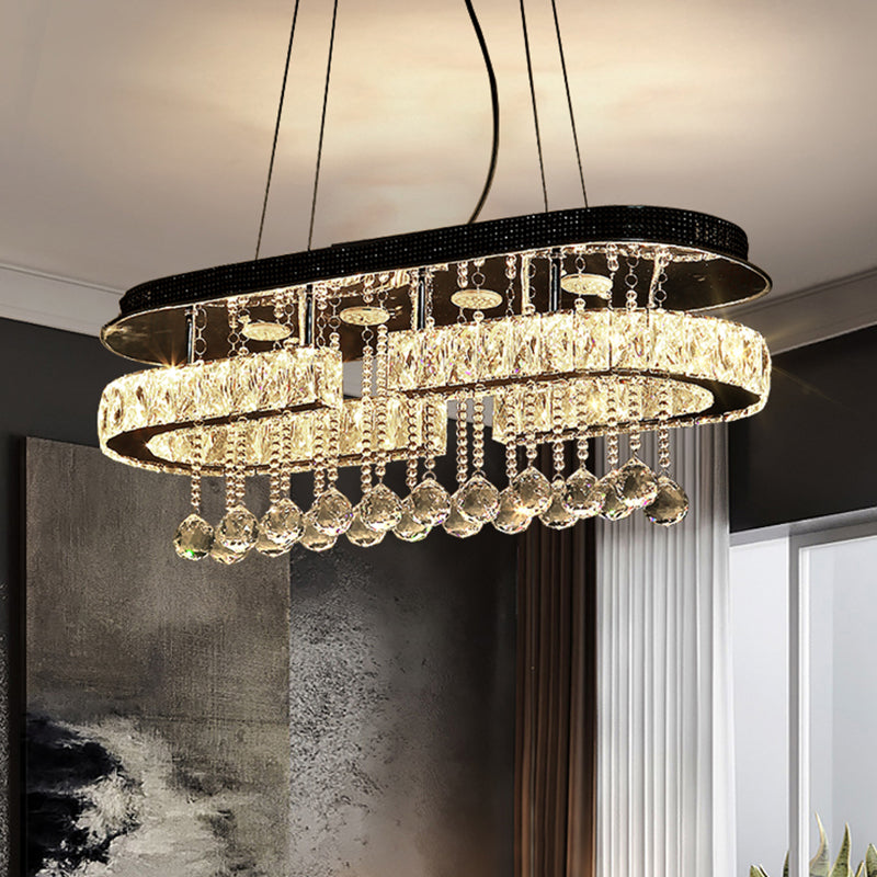 Modern LED Crystal Pendant Light with Stainless Steel Frame and Tassel Accents