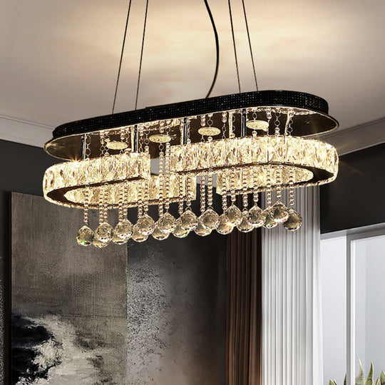 Modern LED Crystal Pendant Light with Stainless Steel Frame and Tassel Accents