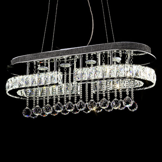 Modern LED Crystal Pendant Light with Stainless Steel Frame and Tassel Accents