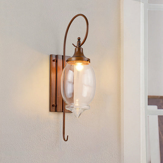 Traditional Brown Glass Bottle Sconce - Outdoor Wall Lighting with Clear 1-Light Fixture