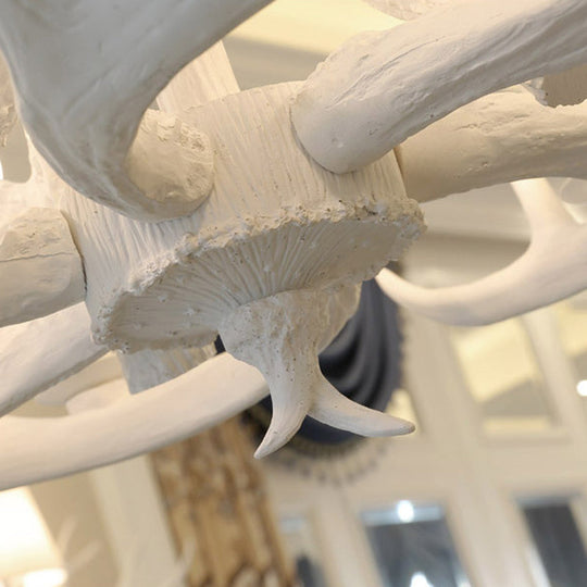 Rustic White Retro Resin Deer Horn Chandelier in Bedroom