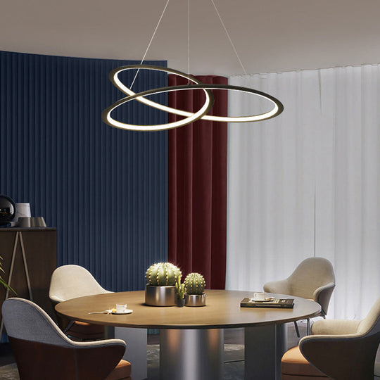 Metal LED Chandelier: Sleek Seamless Curves for Minimalistic Dining Room Lighting
