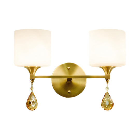 Modern Milk Glass Wall Sconce with Brass Finish and Amber Crystal Draping