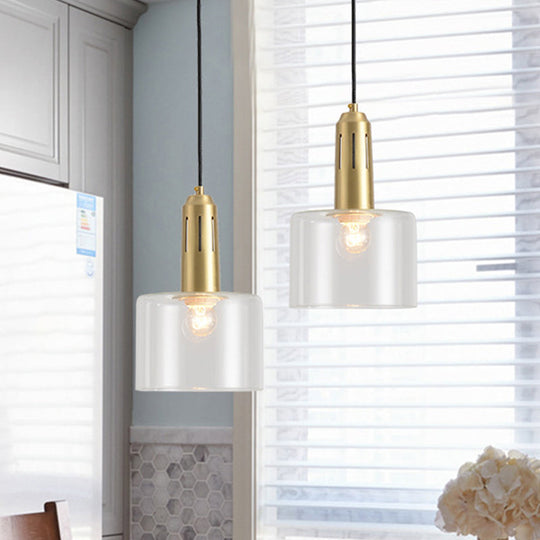 Postmodern Brass Pendant Lamp with Clear Glass Shade: Sleek Dining Room Hanging Light