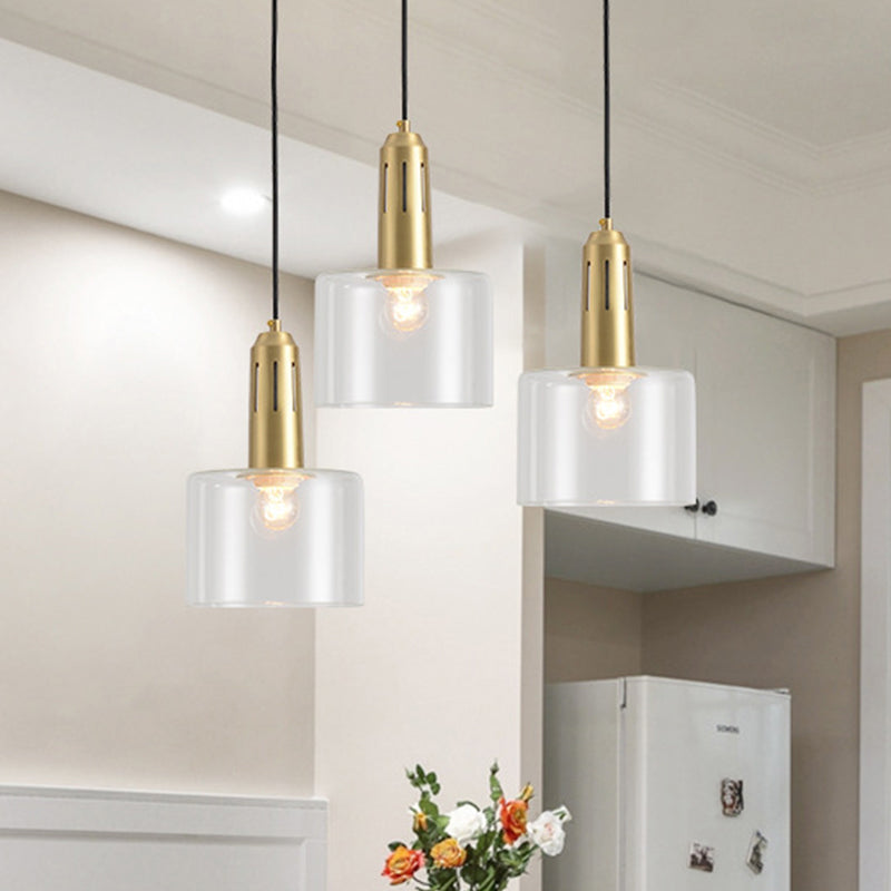 Postmodern Brass Pendant Lamp with Clear Glass Shade: Sleek Dining Room Hanging Light