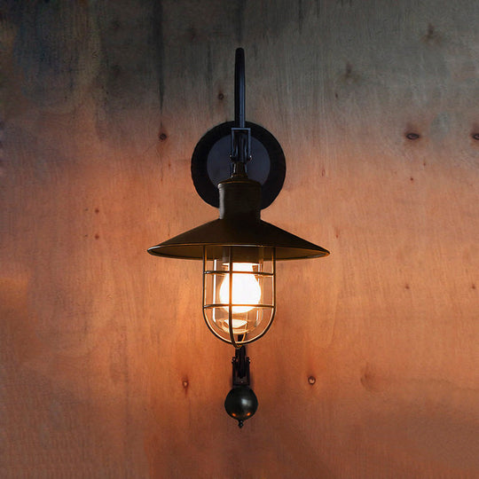 Industrial Sconce Light with Adjustable Pulley - Black Finish, Clear Glass, and Caged Design
