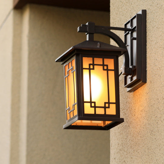 Metallic Outdoor Wall Sconce with Yellow Glass Shade: Cuboid Country-Style 1-Bulb Lamp in Black