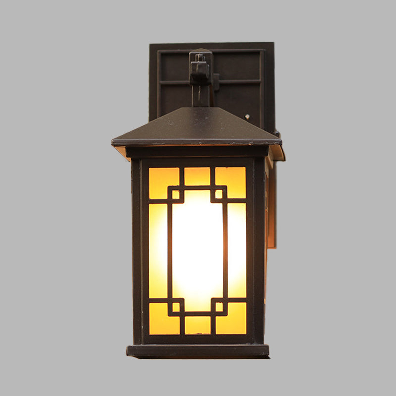 Metallic Outdoor Wall Sconce with Yellow Glass Shade: Cuboid Country-Style 1-Bulb Lamp in Black