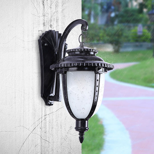 Country Black/Bronze Urn Sconce Wall Lamp with Weather-Resistant Glass - 1-Bulb Fixture