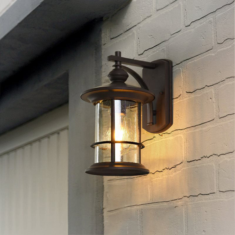 Clear Seeded Glass Cylinder Sconce Outdoor Wall Mounted Lamp for Garden - 1-Bulb, Black/Coffee Finish