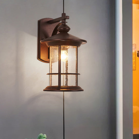 Clear Seeded Glass Cylinder Sconce Outdoor Wall Mounted Lamp for Garden - 1-Bulb, Black/Coffee Finish