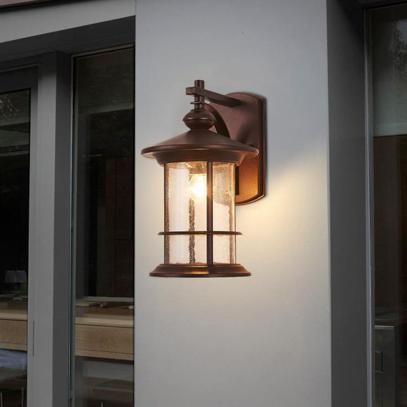 Clear Seeded Glass Cylinder Sconce Outdoor Wall Mounted Lamp for Garden - 1-Bulb, Black/Coffee Finish