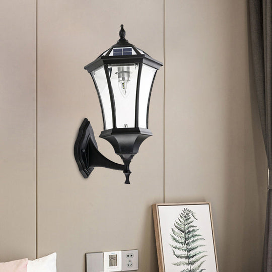 Hexagonal Corridor Wall Sconce with Clear Glass and Solar-Powered Black Bulb