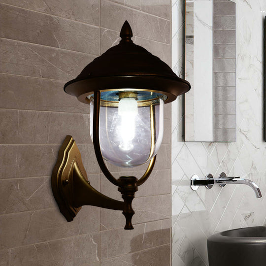 Lodges Urn 1-Light Sconce: Sleek Black/Brass Wall Lighting with Clear Glass Shade