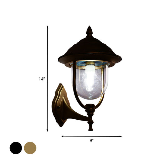 Lodges Urn 1-Light Sconce: Sleek Black/Brass Wall Lighting with Clear Glass Shade