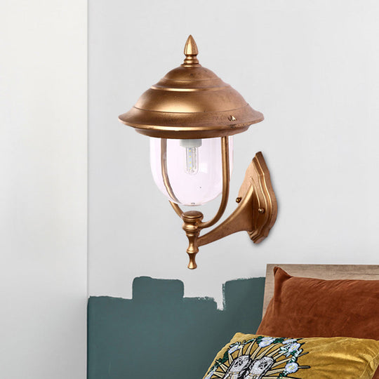 Lodges Urn 1-Light Sconce: Sleek Black/Brass Wall Lighting with Clear Glass Shade