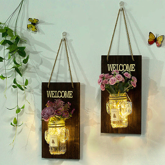 Rustic Style Clear Glass Shade Wall Sconce with Purple Flower Wall String Lights for Cafe