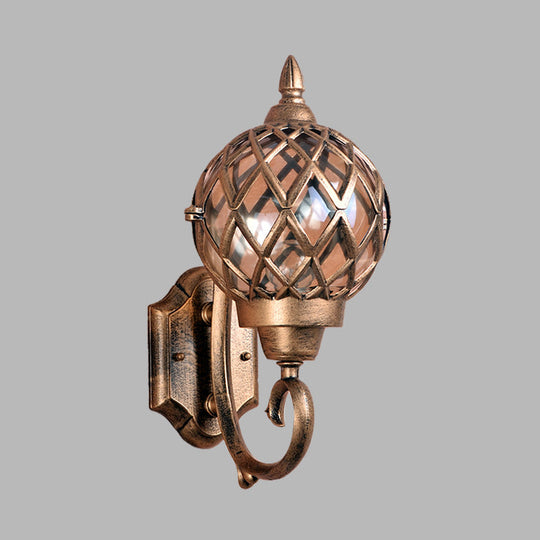 Brass Outdoor Wall Mount Lamp with Clear Glass Globe, Cage, and 1-Bulb Sconce Lighting