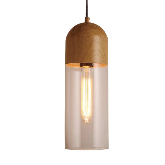 Modern Clear Glass Pendant Light: Sleek Half-Capsule Design, Wood Fixture for Bedroom