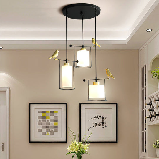 Cylinder Cluster Pendant Dining Room Lamp - Cream/Smoke Gray Glass, Modernism Design with Gold Bird Deco (3 Bulbs)