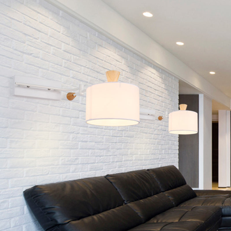 Modernist Drum Fabric Wall Sconce with Rotatable Arm and White Finish