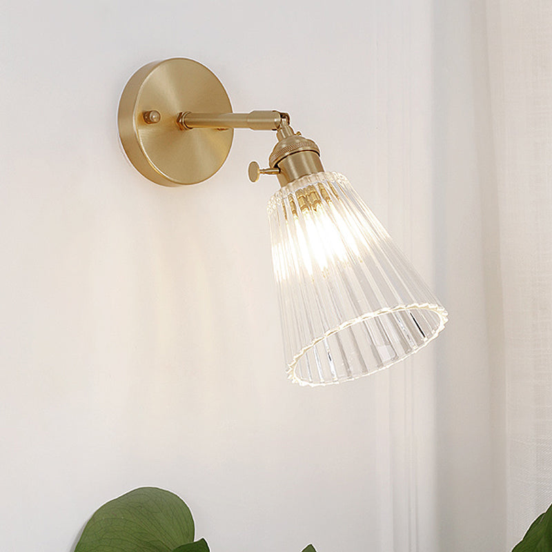 Clear Textured Glass Wall Sconce with Brass Accents for Industrial Dining Room Lighting