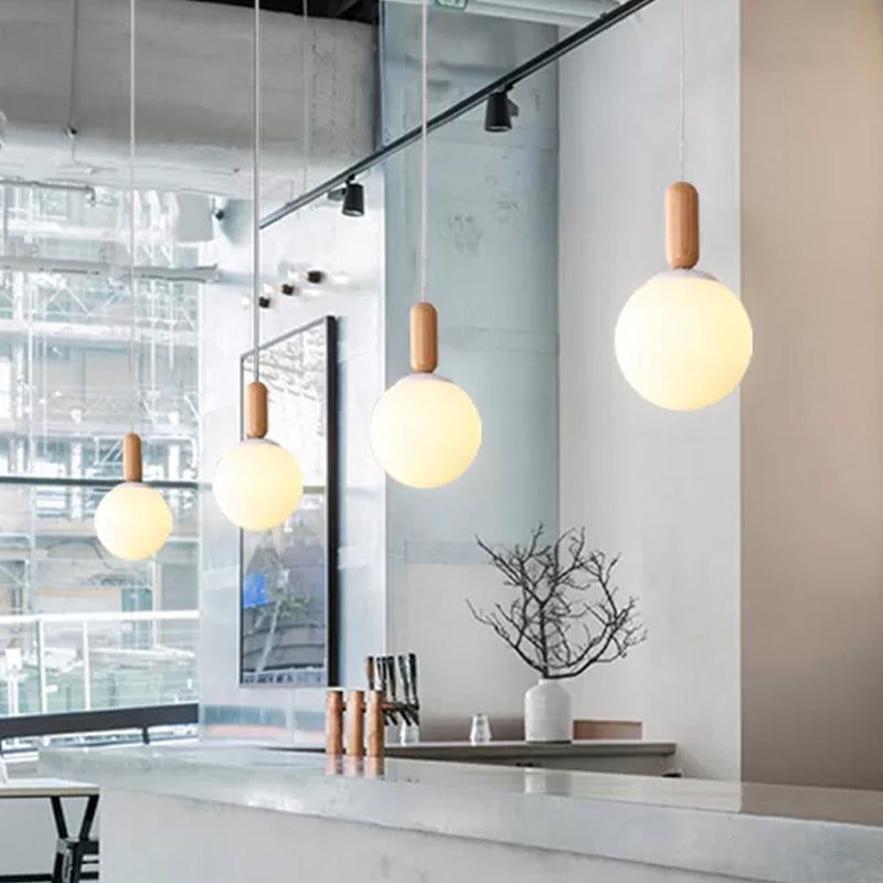 Sleek Kitchen Pendant Light: White/Cognac Glass, Minimalist Design with Wood Grip