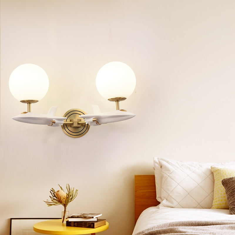Gold Spaceship Wall Sconce with Cream Glass Globe for Kids Room - 1/2 Bulb Fixture in White & Gold