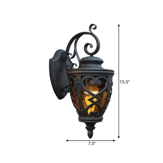 Courtyard Wall Light Fixture: Elegant Urn Shape, One Amber Glass Light, Black Mount