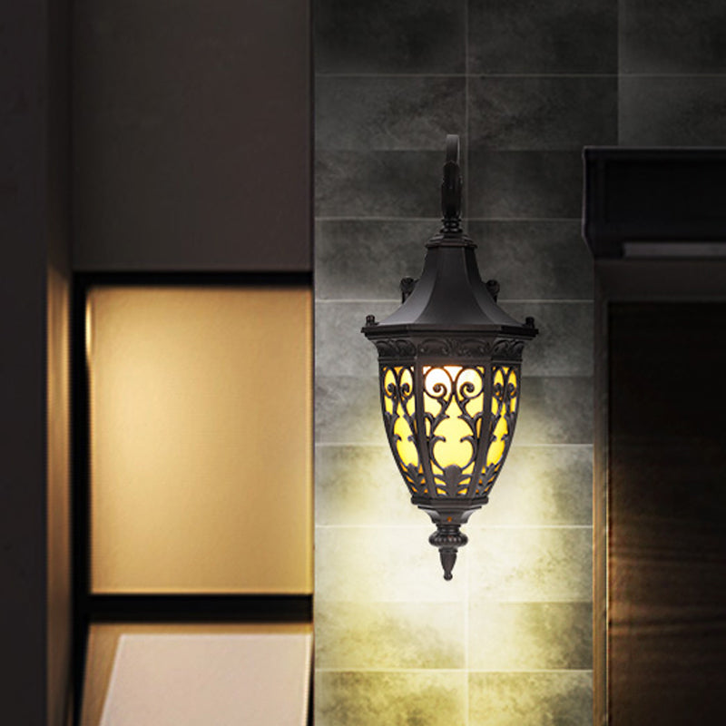 Classic 1-Light Outdoor Wall Hanging Light in Black with Metal Curving Design and Urn Yellow Glass Shade