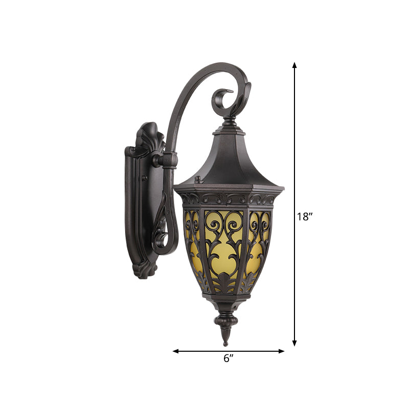 Classic 1-Light Outdoor Wall Hanging Light in Black with Metal Curving Design and Urn Yellow Glass Shade